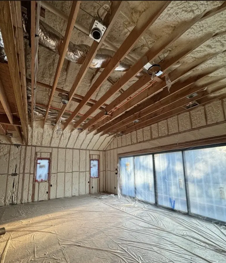 Interior walls and ceiling insulated with spray foam during new construction in Edmonds